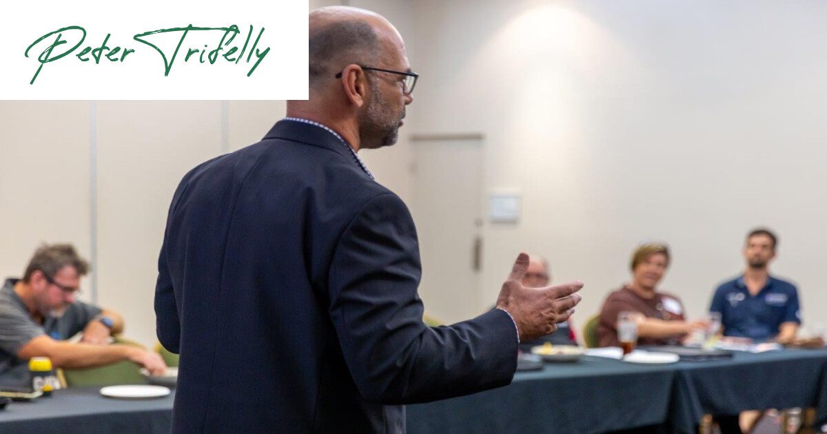 Peter Triffely coaching a group of Business Professionals